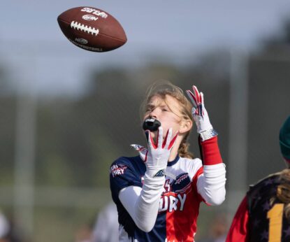 Girl Football Catching